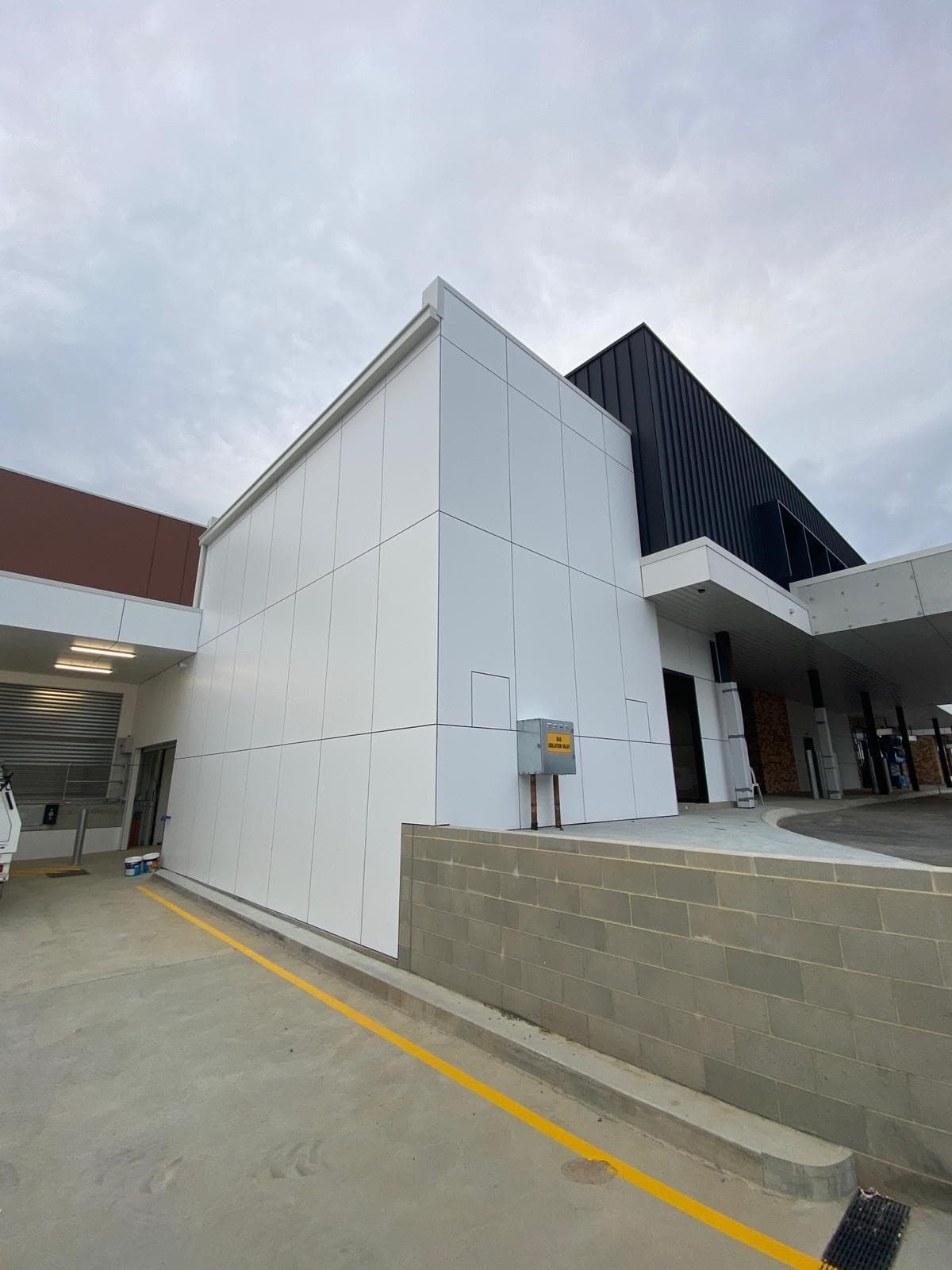 Midvale Central facade installation — view 2, Midvale, WA — GreenLine Facades